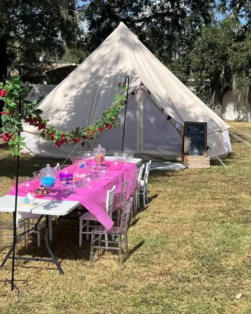 The Transform Your Events includes a pink tent complete with a cozy table and chairs for an unforgettable movie viewing experience.