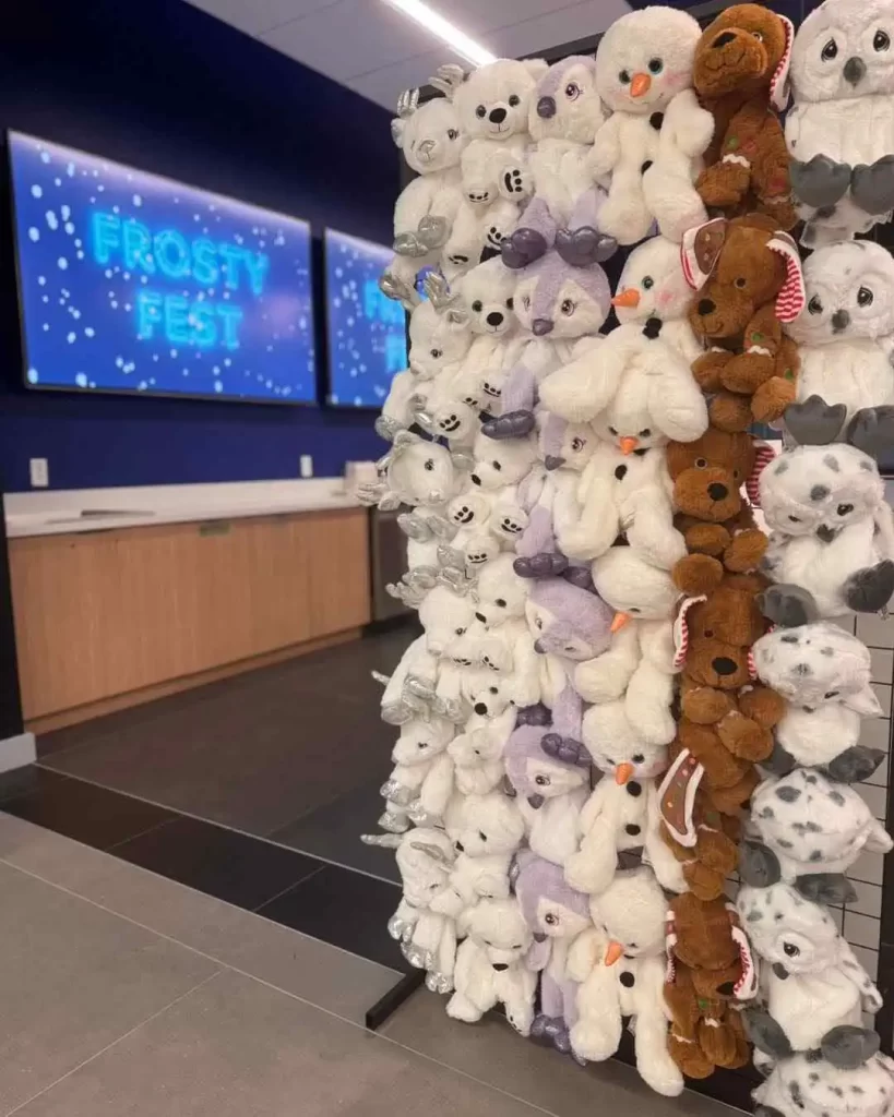 A collection of stuffed animals in a store, perfect for creating the Ultimate Movie Night Setup Training Package - Transform Your Events.
